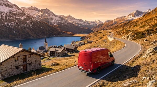 Delivery van on a Swiss alpine road at golden hour — foreign brands selling online in Switzerland
